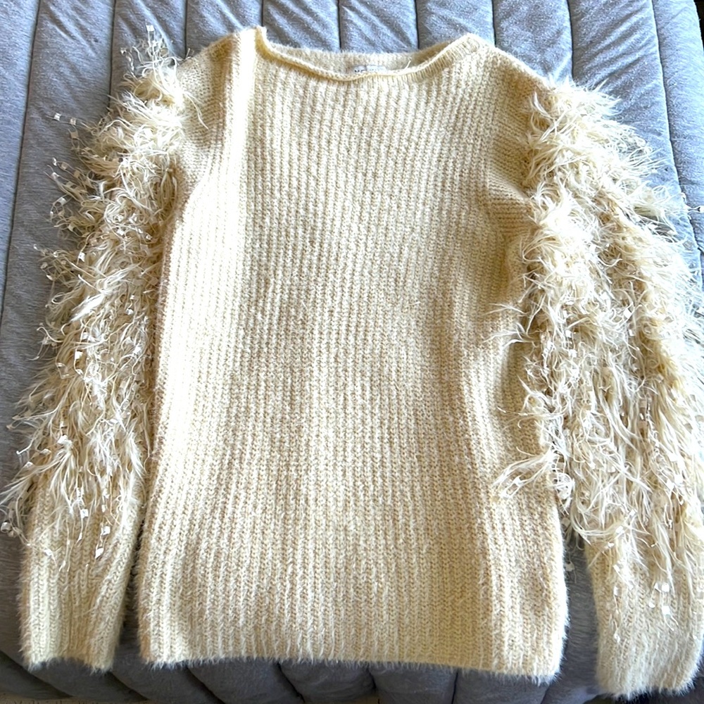 Fun fringe off white sweater!!! Perfect for cold weather. Only worn once.